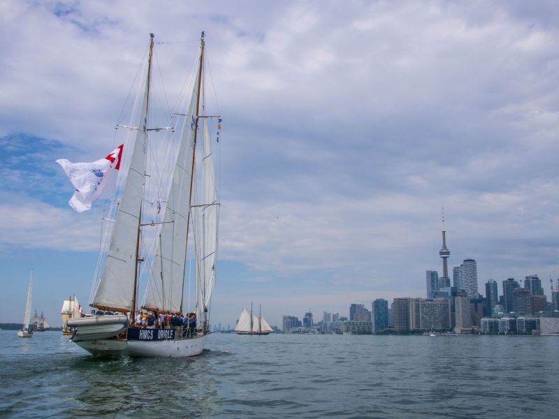 HMCS Oriole participates in the Parade of Ships as they all position to perform a Sail Pass by the Toronto lakefront during the Great Lakes Deployment on June 28th 2019.

Photo by: LS A.J. Domingo